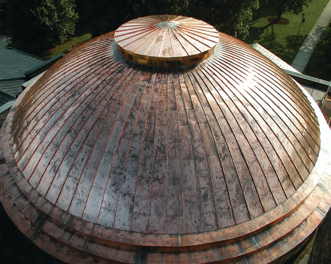 Craftsman Roofing crew installing a new roof in McNair Village